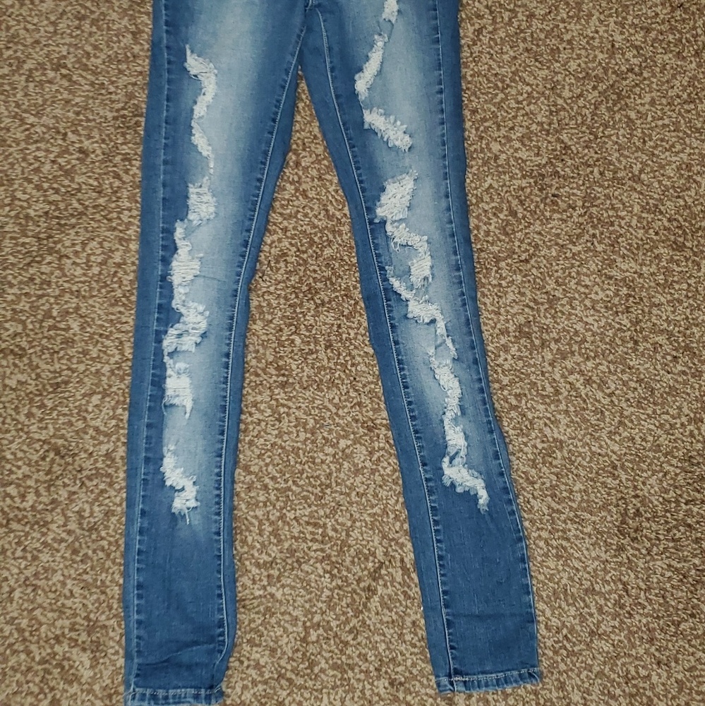 Ripped woman jeans - Picture 2 of 4